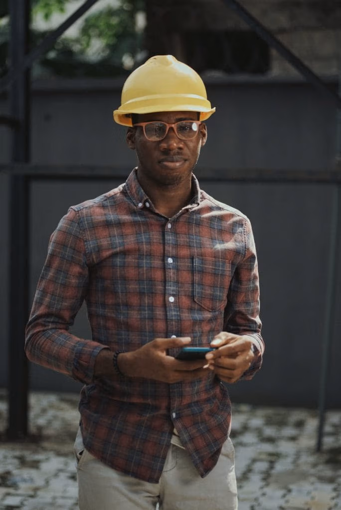 tradesman with mobile phone